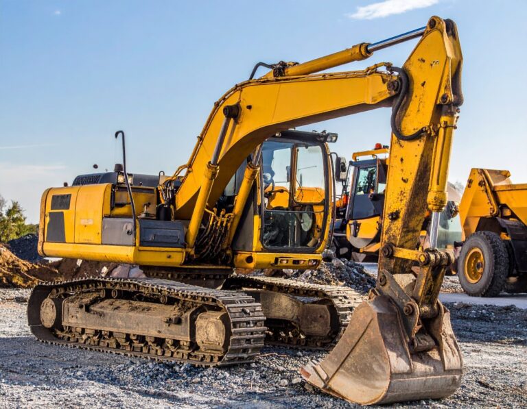 Commercial construction equipment operating on a job site, illustrating real-world use of bulk diesel delivery services, commercial fueling programs, and diesel truck refueling to maintain productivity and reduce downtime.