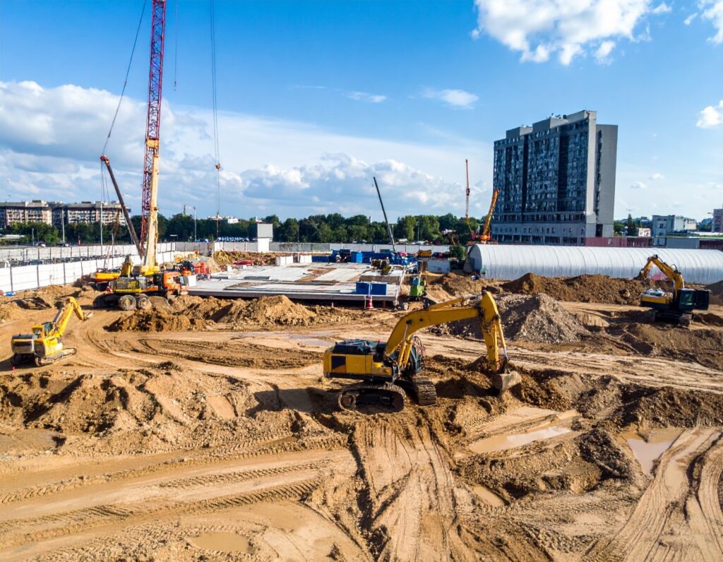 View of the ground floor of an active construction site, where off-road fueling strategies, mobile fuel delivery, and on-site equipment diesel service support smooth operations.