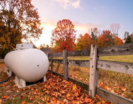 A propane tank installed on a farm, demonstrating safe and reliable Central Penn Propane, residential propane, propane delivery service for rural properties.