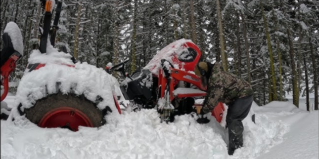Equipment broken down on the side of the road in winter due to poor diesel fuel additives usage.