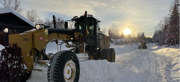 Equipment on the roadside broken down due to fuel freezing, emphasizing the importance of diesel fuel additives.