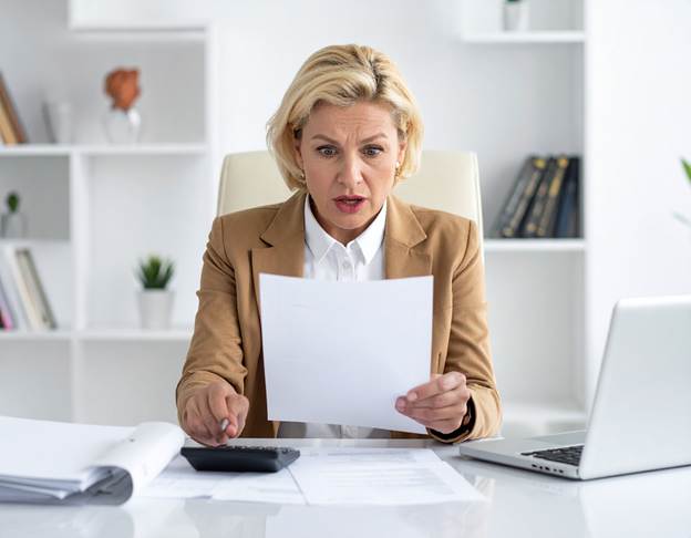 Business owner upset after seeing high winter energy costs on their monthly utility bill.