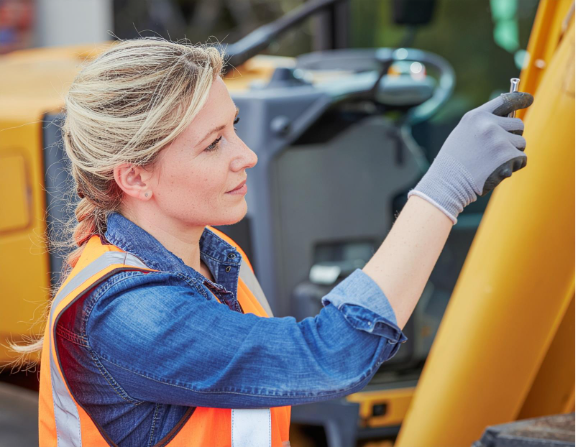 Professional diesel inspector checking off-road diesel fuel quality in Berks County, ensuring equipment runs efficiently and safely during fall maintenance.
